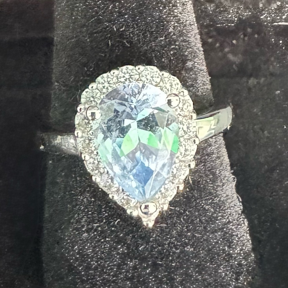 Elegant ,925 Silver and Blue Topaz Teardrop Ring sz 6